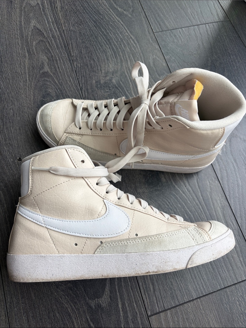 Nike Women's High-Top Sneakers in Cream with White Swoosh